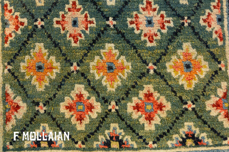 فرش کوچک آنتیک تبتی با طرح لوزی زمینه سبز کد:۴۲۶۷۷۹۶۴